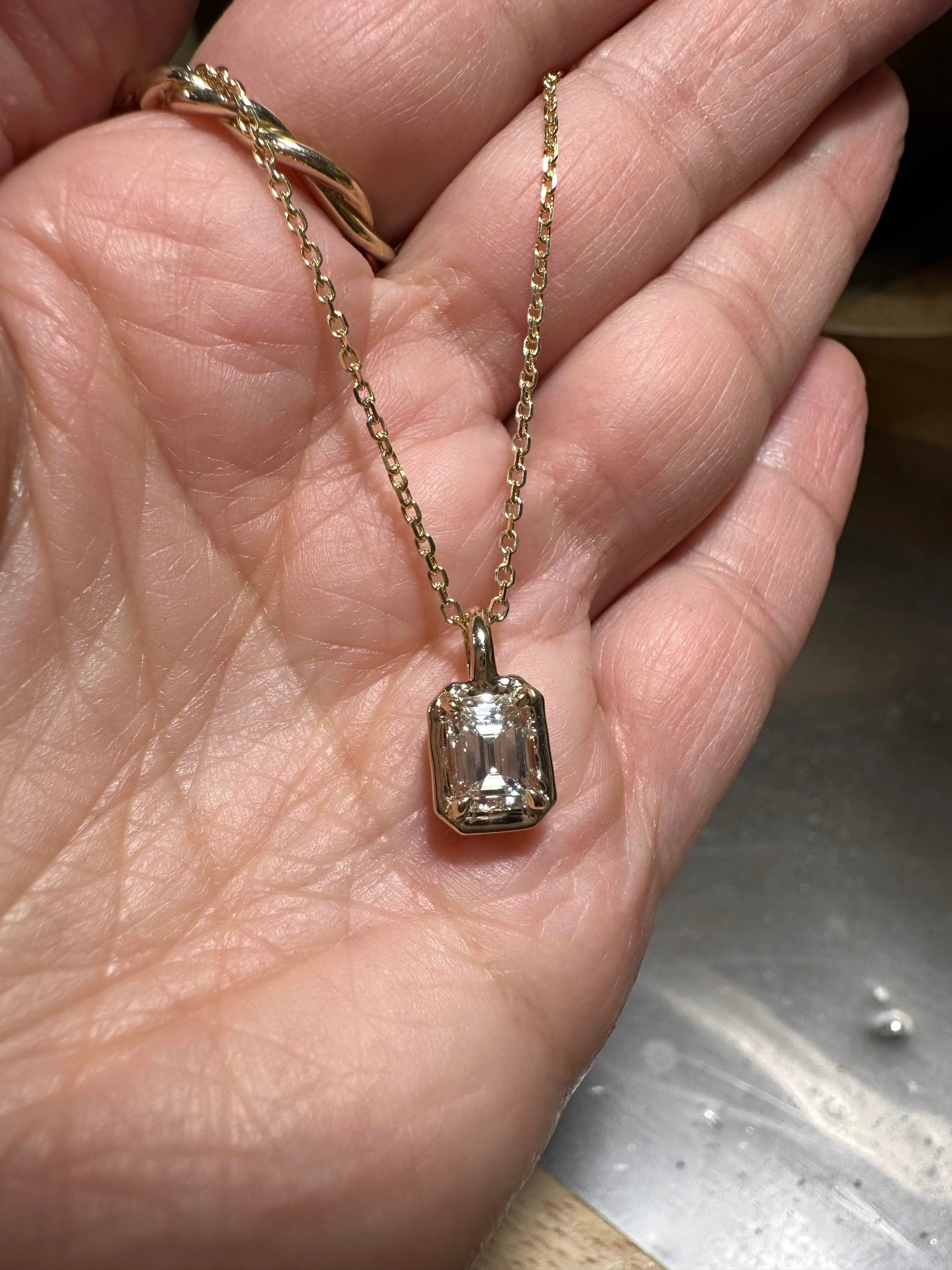 custom emerald cut diamond necklace in gold by talisman fine jewelry