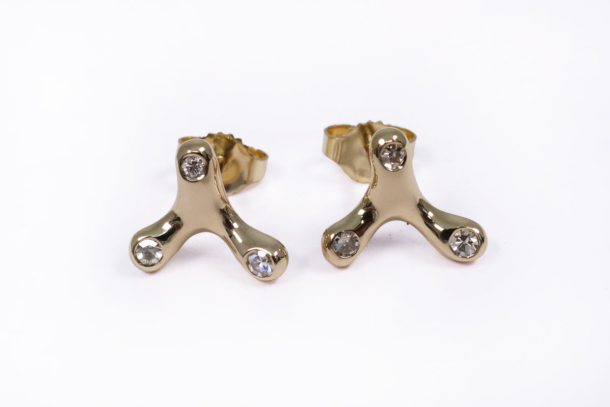 talisman fine jewelry constellation earrings handmade in recycled 14k gold and 3 mismatched diamonds