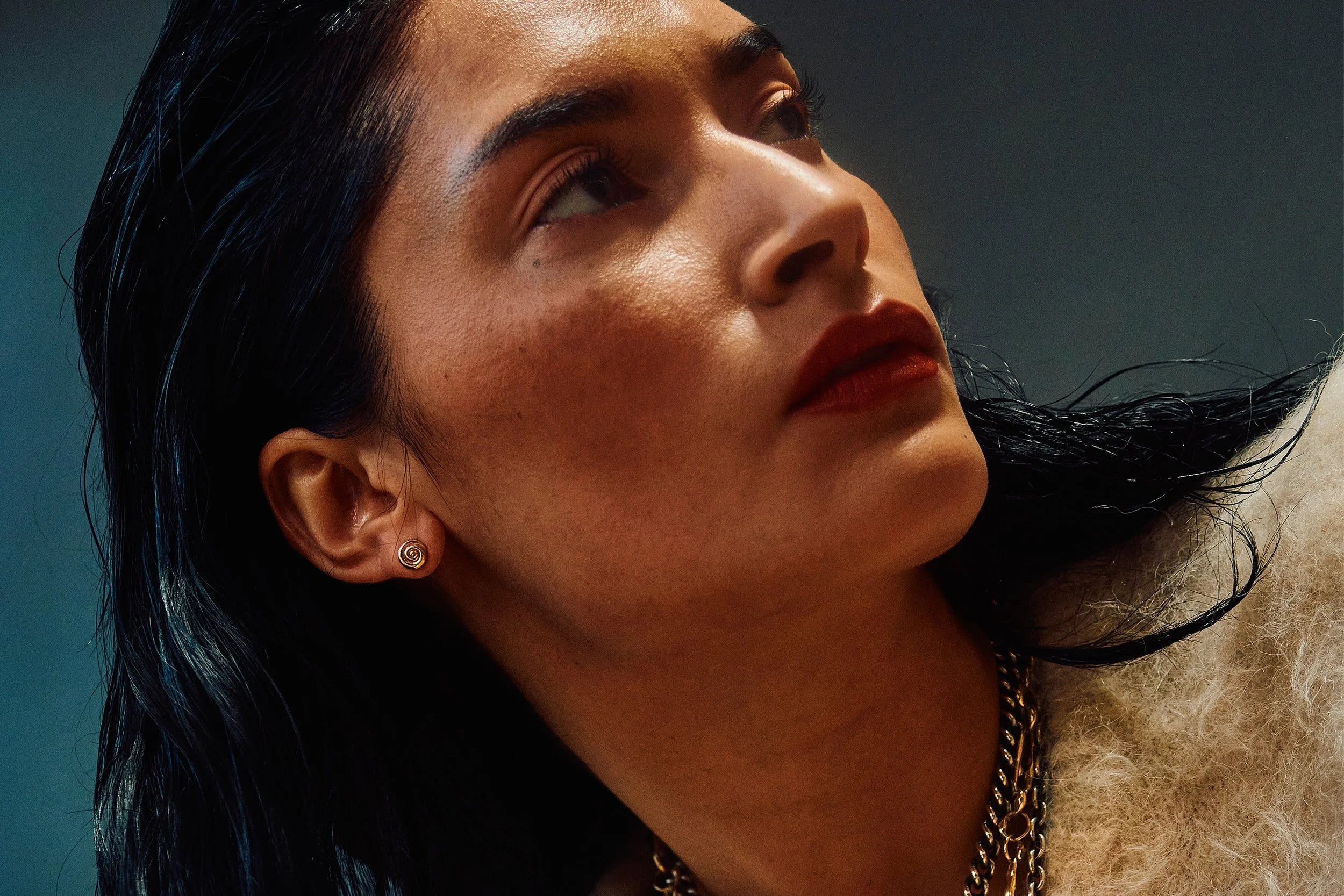 Model Thaiara wears the Growth Spiral Studs.