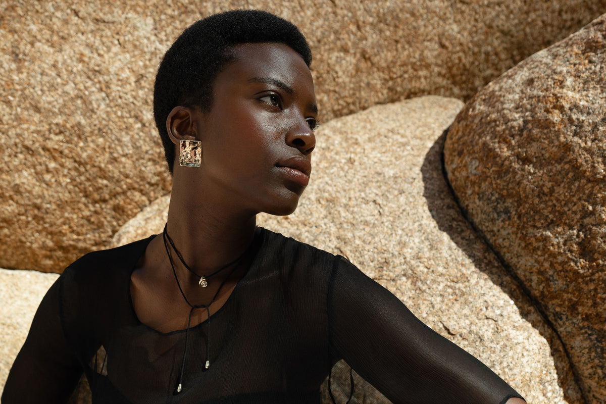 talisman fine jewelry plane earrings and growth necklace, all handmade in recycled 14k gold