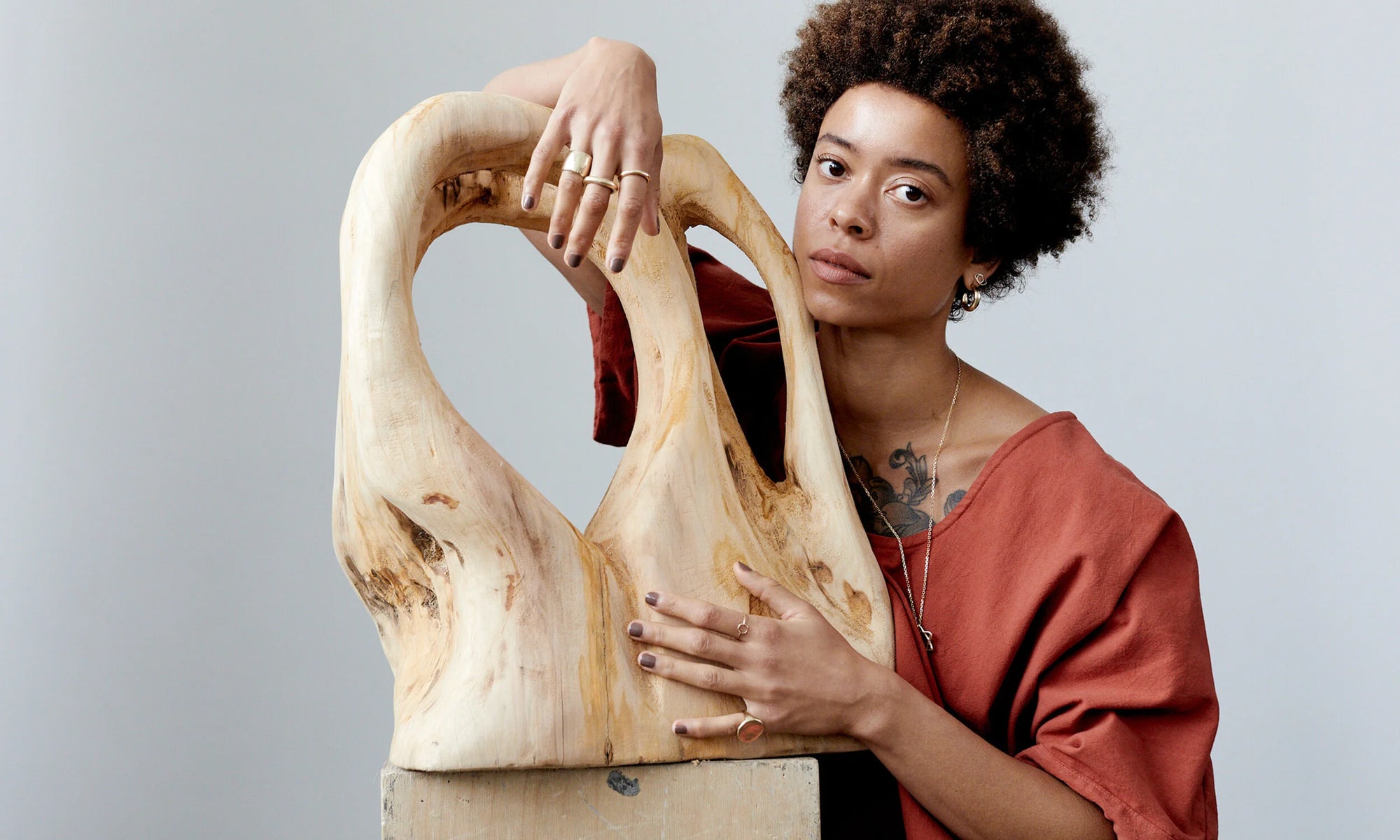 On Niki's hands: The Ra Pinky Signet, Rollo Band, Circle Ring, Demeter Cigar Ring, and Petite Rollo Band. She also wears the Rollo Hoops, Protective Eye Stud, and the Solomon's Seal Necklace. Hand carved and cast in recycled 14k gold using traditional lost wax casting techniques.