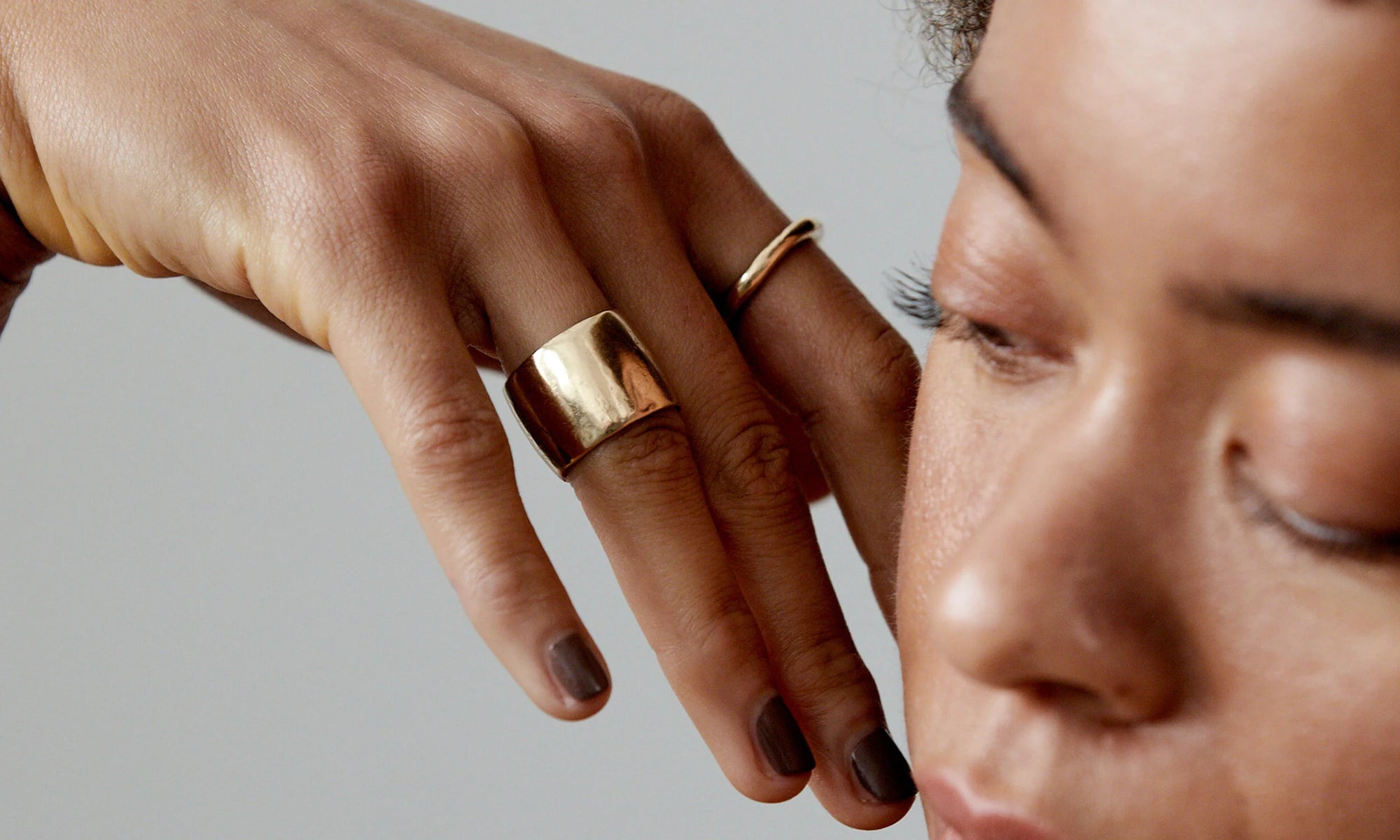 The Demeter Cigar Ring and Petite Rollo Band, hand carved and cast in recycled 14k gold using traditional lost wax casting techniques.