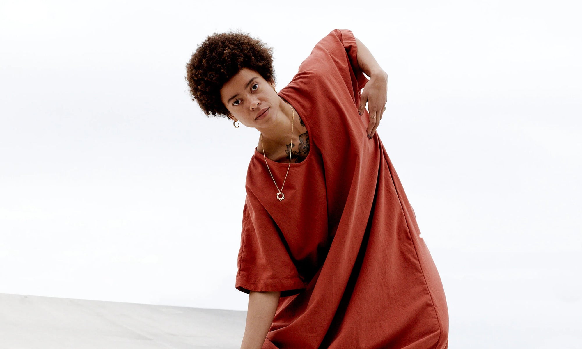 Intuitive movement in the Solomon's Seal Necklace, recycled 14k gold rings, and the Rollo Hoops.