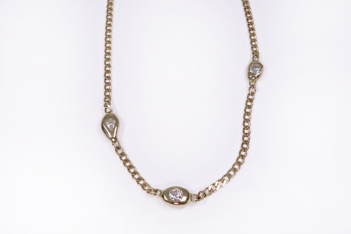 talisman fine jewelry constellation necklace with 14k gold curb chain and asymmetrical diamond pendants