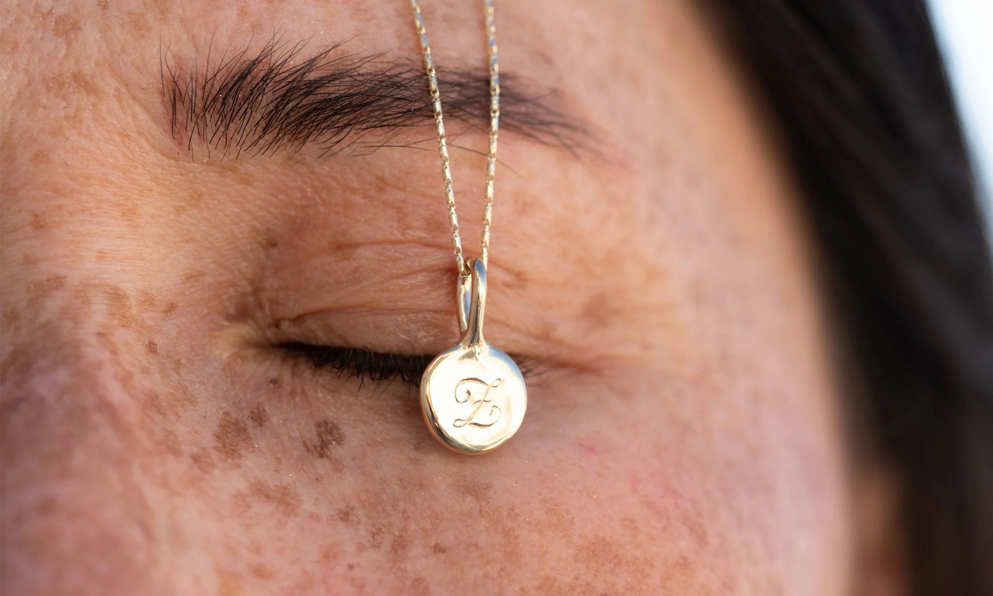 The Alex Engravable Amulet Necklace: a love letter to your besties. Handmade in recycled 14k gold.