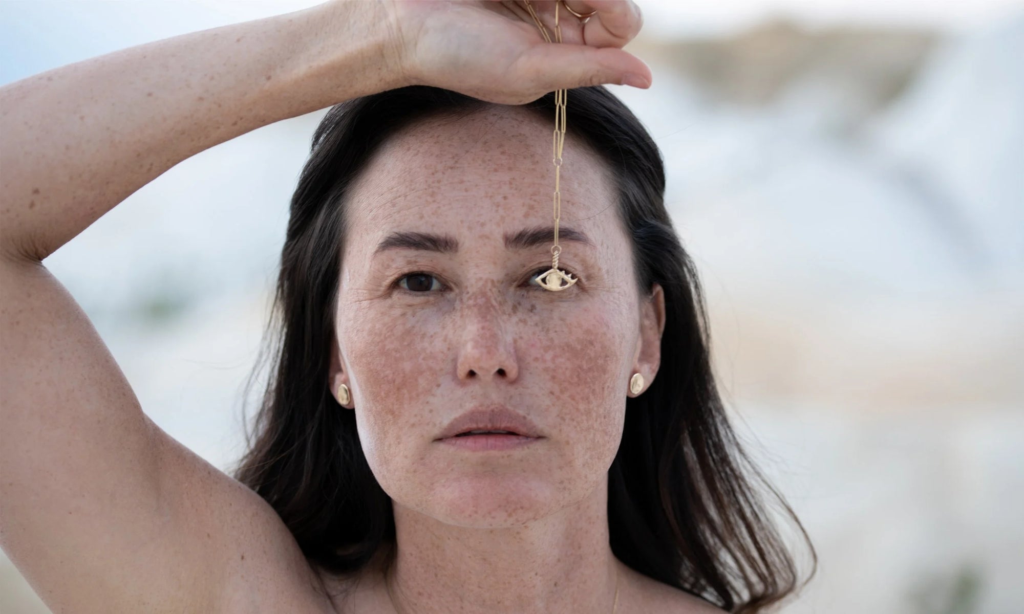 The Protective Eye Y Necklace, charged with intention to call in protective energies. Sustainably handmade in recycled 14k gold.