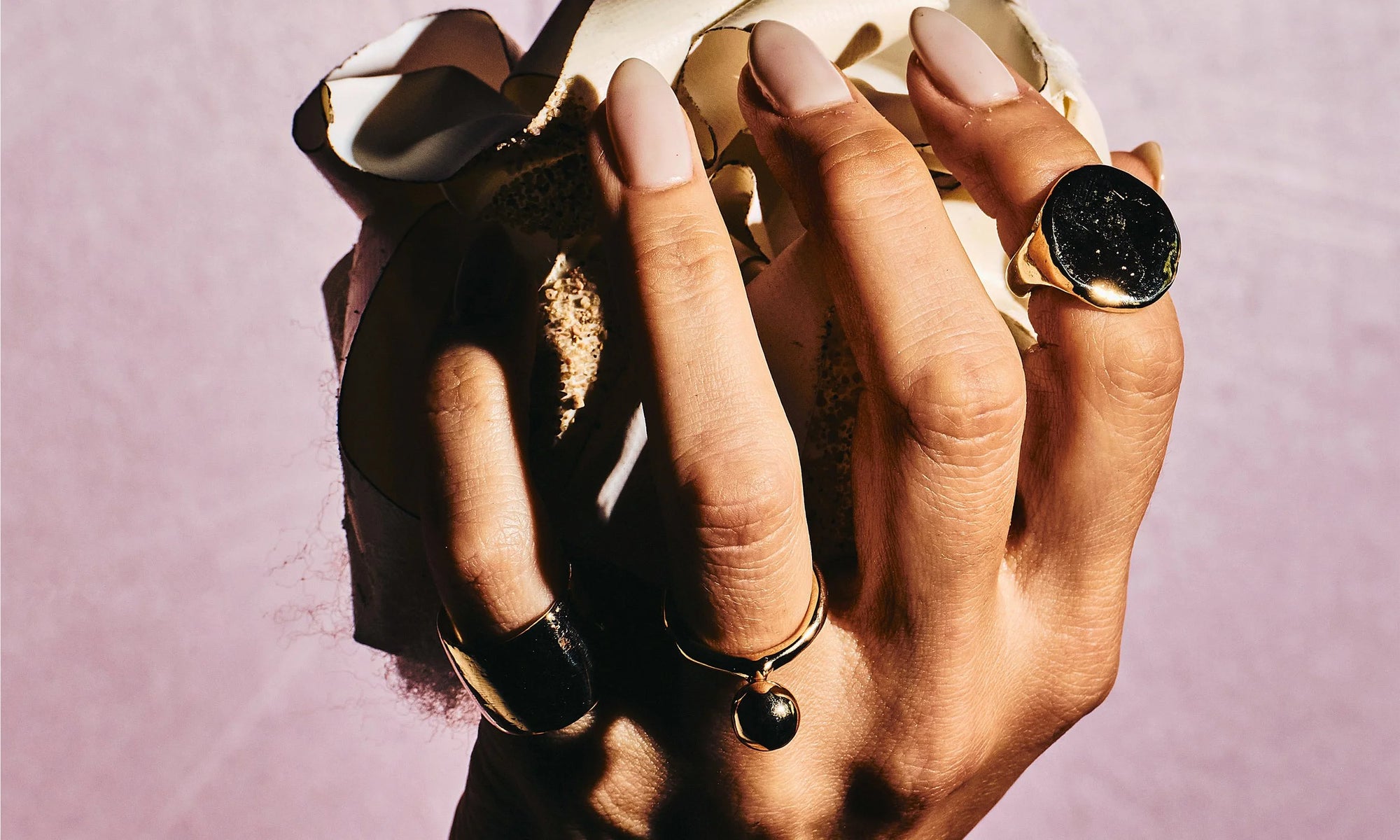 From left: the Demeter Cigar Ring, Central Sun Ring, and Ra Pinky Signet. All hand-sculpted and cast in recycled 14k gold.