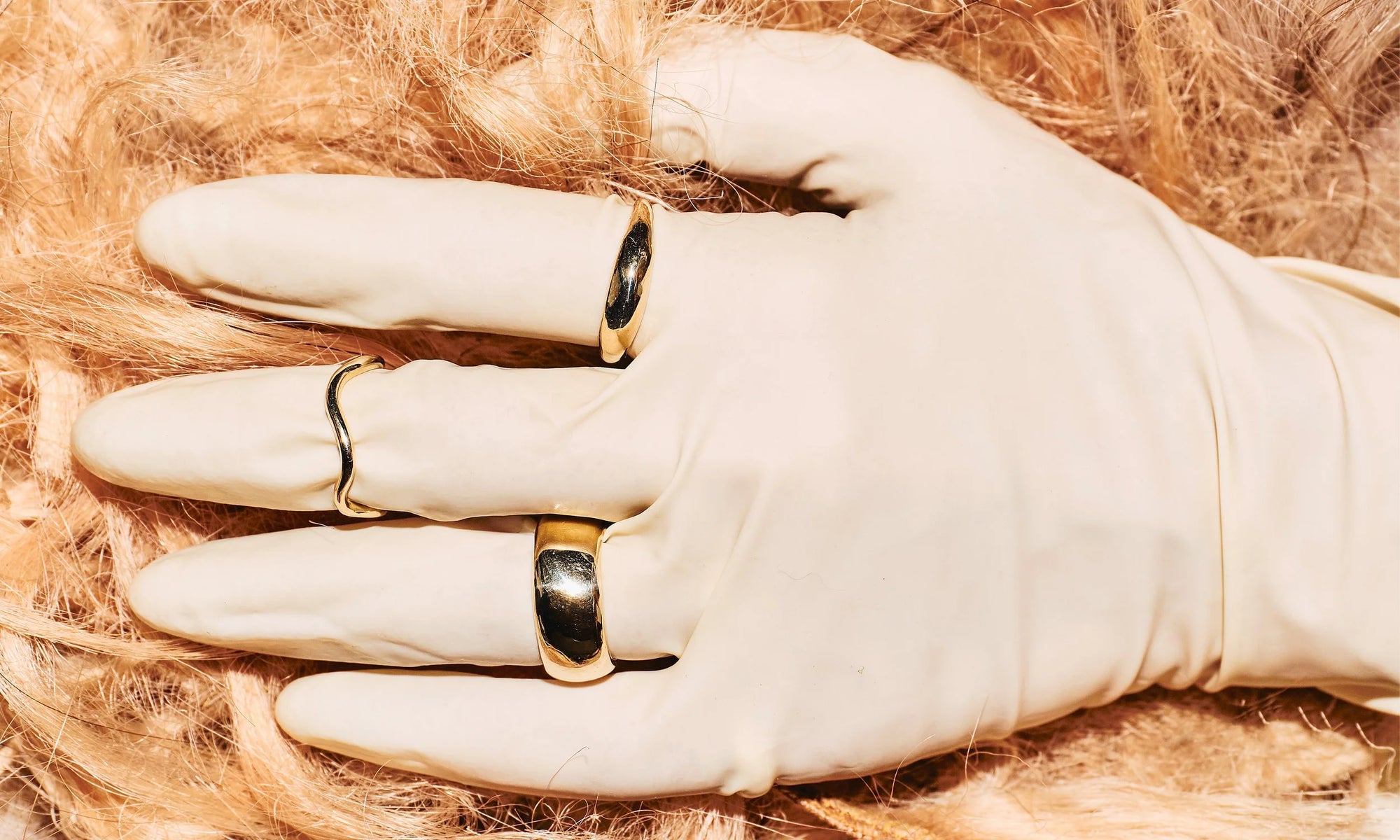 From top: The Portal Ring, Wave Theory Ring, and new Conjunct Cigar Band. All handmade in recycled 14k gold.