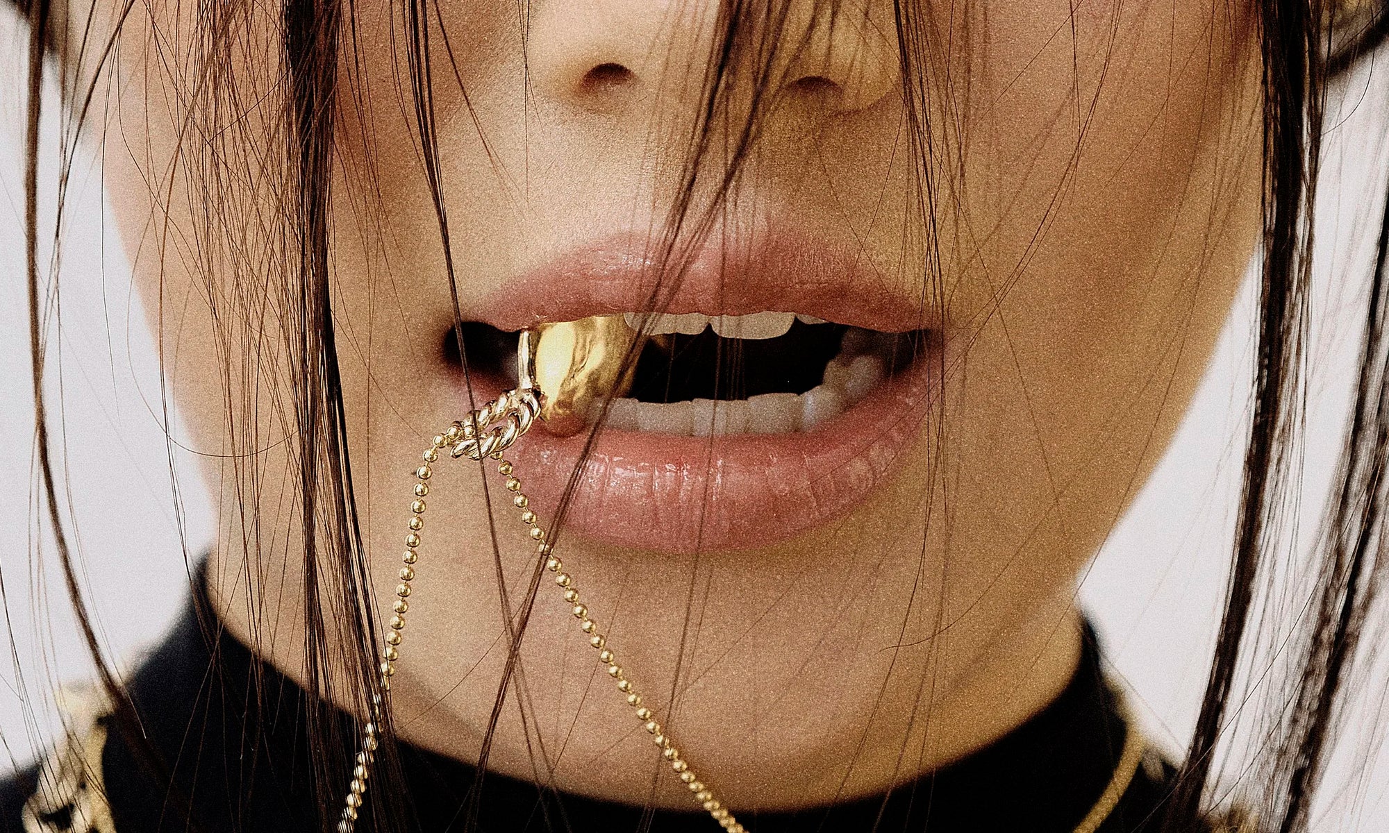 Model Rachel wears the Left BFF Necklace. Sustainably handmade in recycled 14k gold by Talisman Fine Jewelry.