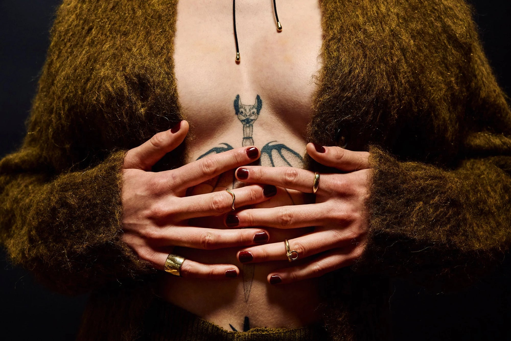 Model Rae wears the Demeter Cigar Band, Wave Theory Ring, Interdependence Ring, and Portal Ring. Each hand-sculpted to reflect Talisman's signature balance of form and meaning.