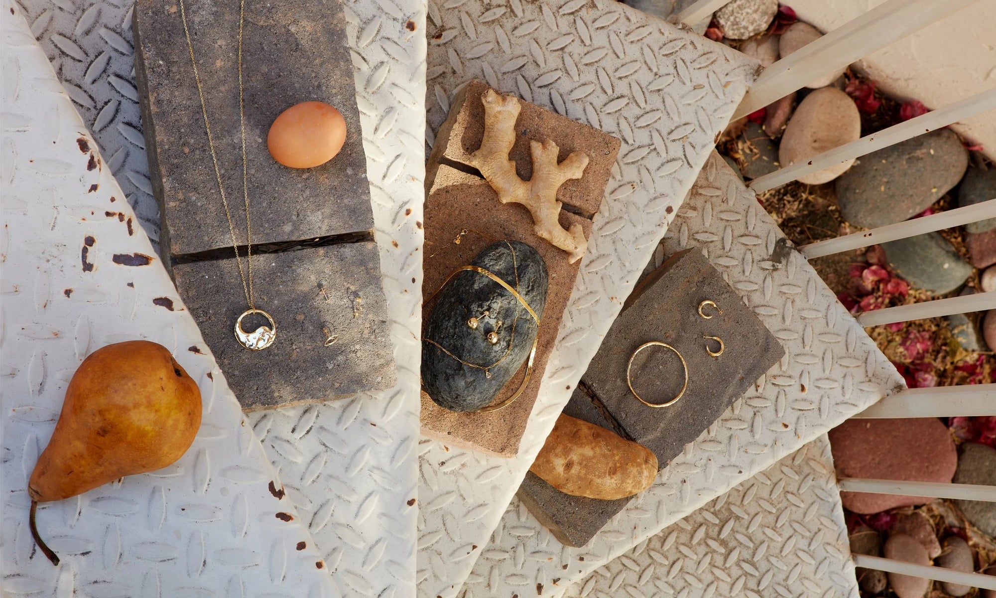 Always spiraling upward, from left: The Yin Yang Necklace, Protective Eye Stud, Mini Orb Stud, Venus Stud, Rose Cut Diamond Drop Necklace, Central Sun Earrings, Flow Chain, Portal Bracelet and Rollo Hoops