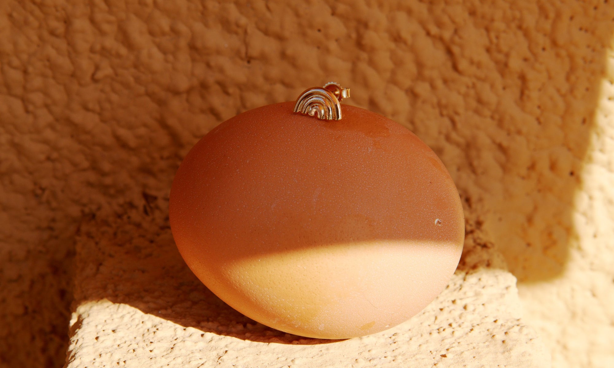 The Rainbow Stud, in solid, recycled 14k gold