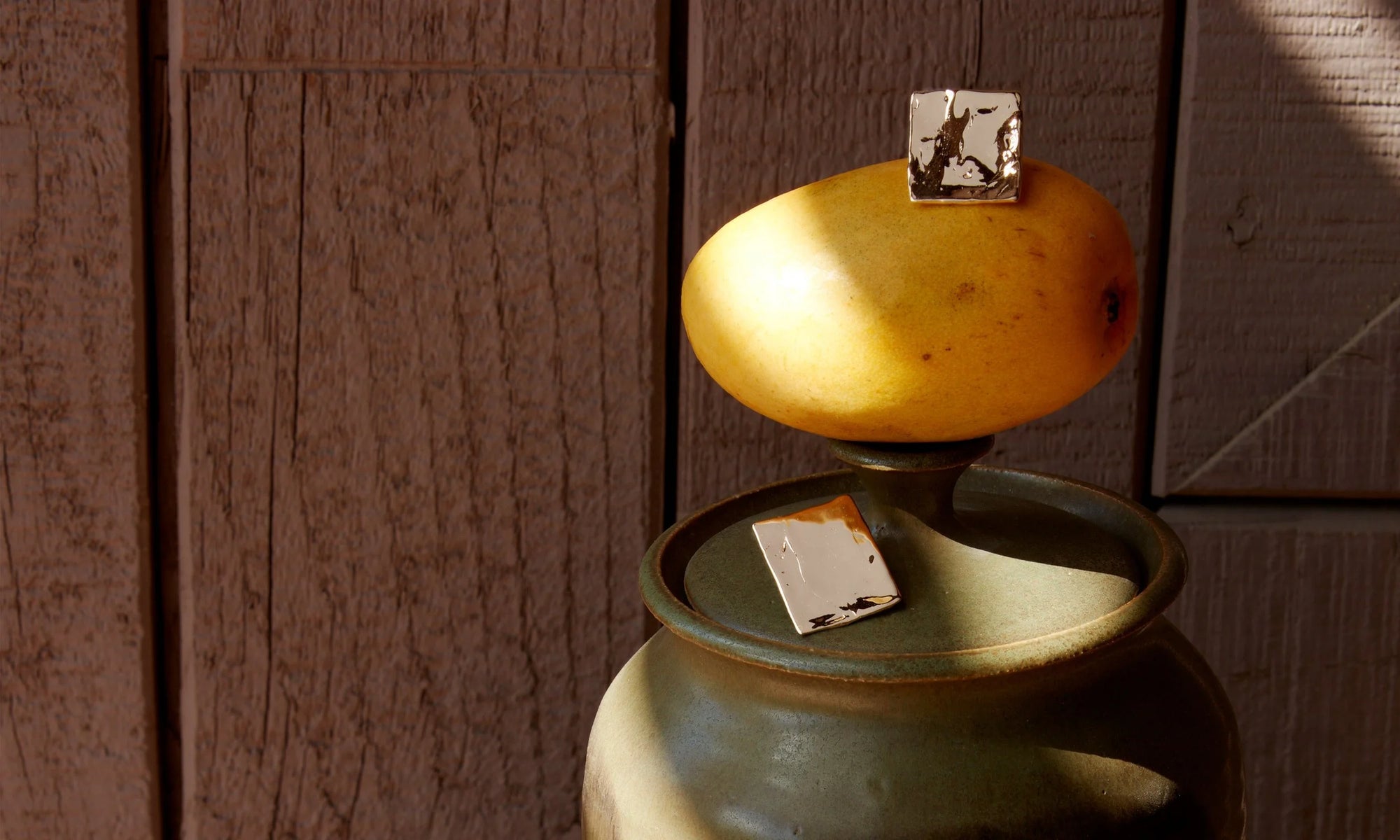 The Plane Earrings, hand-sculpted and cast in solid, recycled 14k gold. Sustainably statement-making.