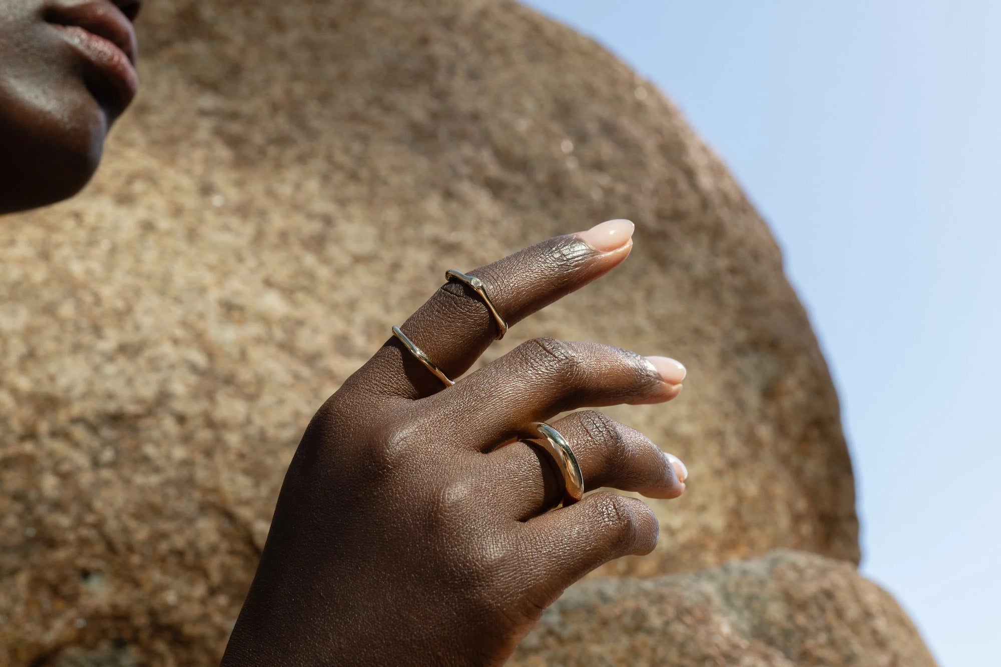 Worn together: the Diamond Sirius B Ring, Diamond Sirius C Ring and the Persephone Ring. Sustainably made with reclaimed diamonds and recycled 14k gold.