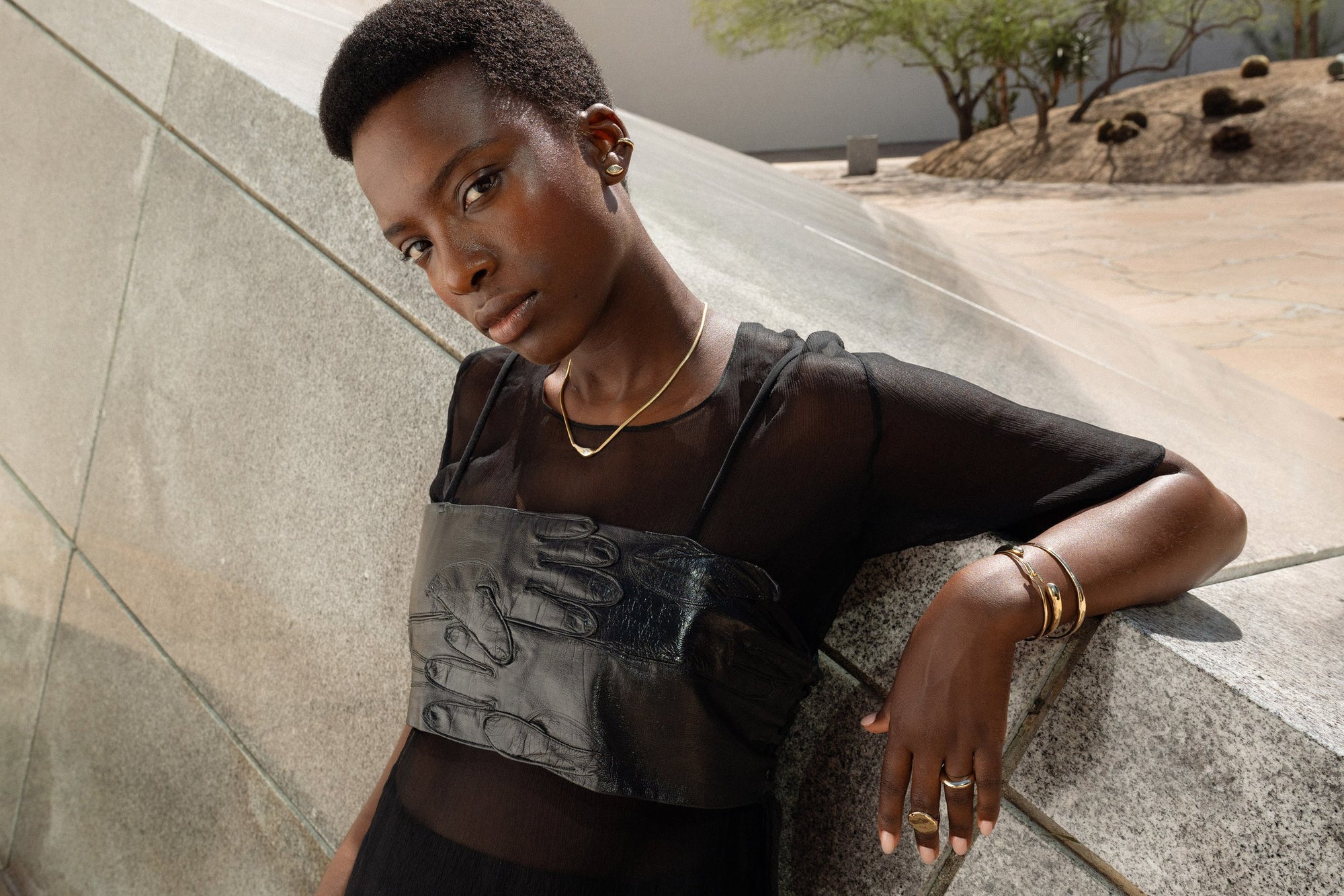 The Sibyl Ear Cuff and marquis diamond Horus Studs are worn with the Where the Light Comes Through Necklace. Also, the Ra Signet Ring, Persephone Ring, Portal and Orbit Bracelets, Inverse Cuff.
