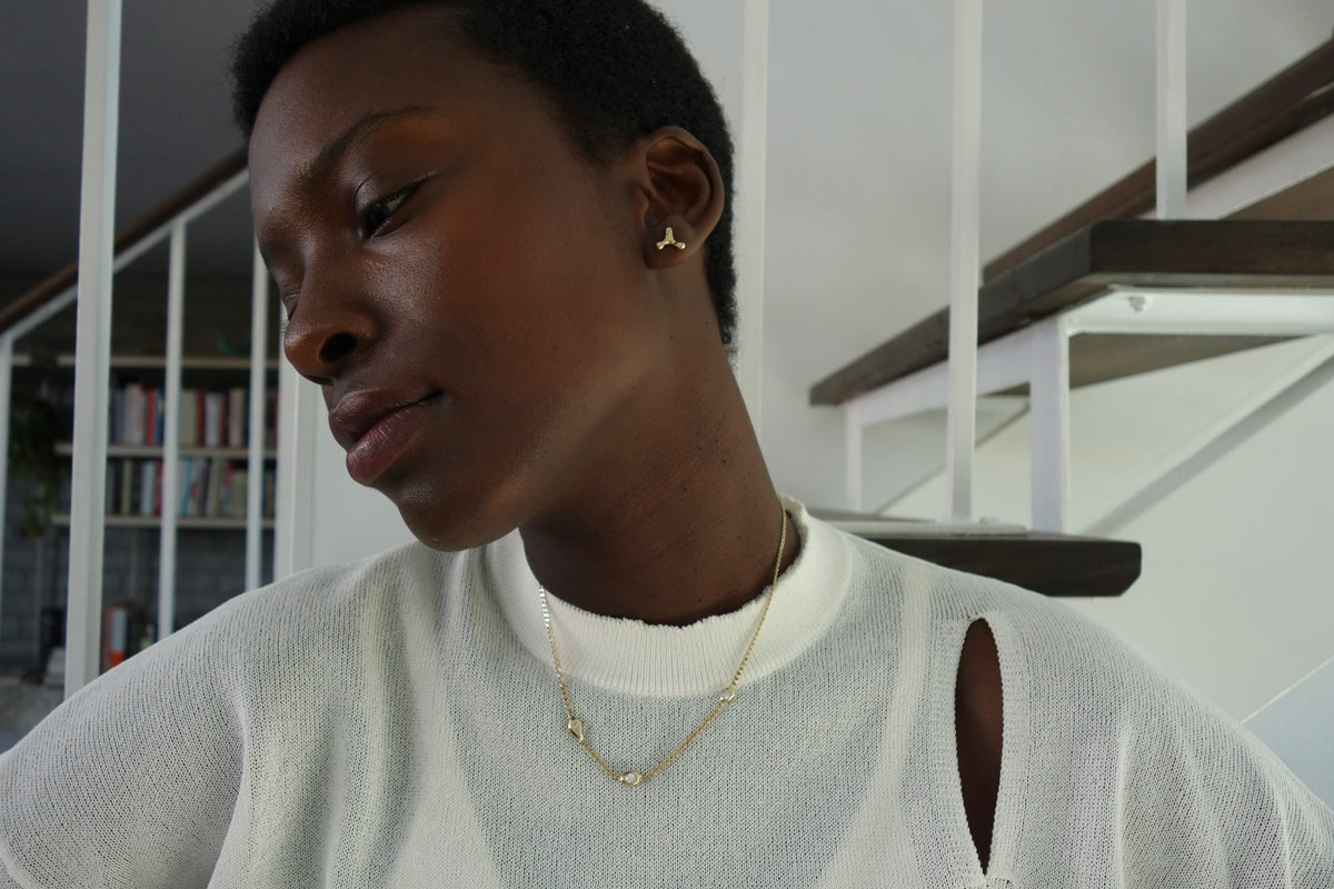 talisman fine jewelry constellation earrings and necklace in 14k gold and natural diamonds