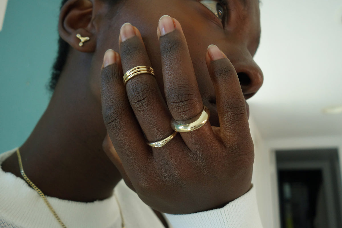 talisman fine jewelry fall 2026 ring collection, including the new Constellation RIng in recycled 14k gold and natural diamonds.  Paired here with the Persephone Ring and Infinite Ring Stack