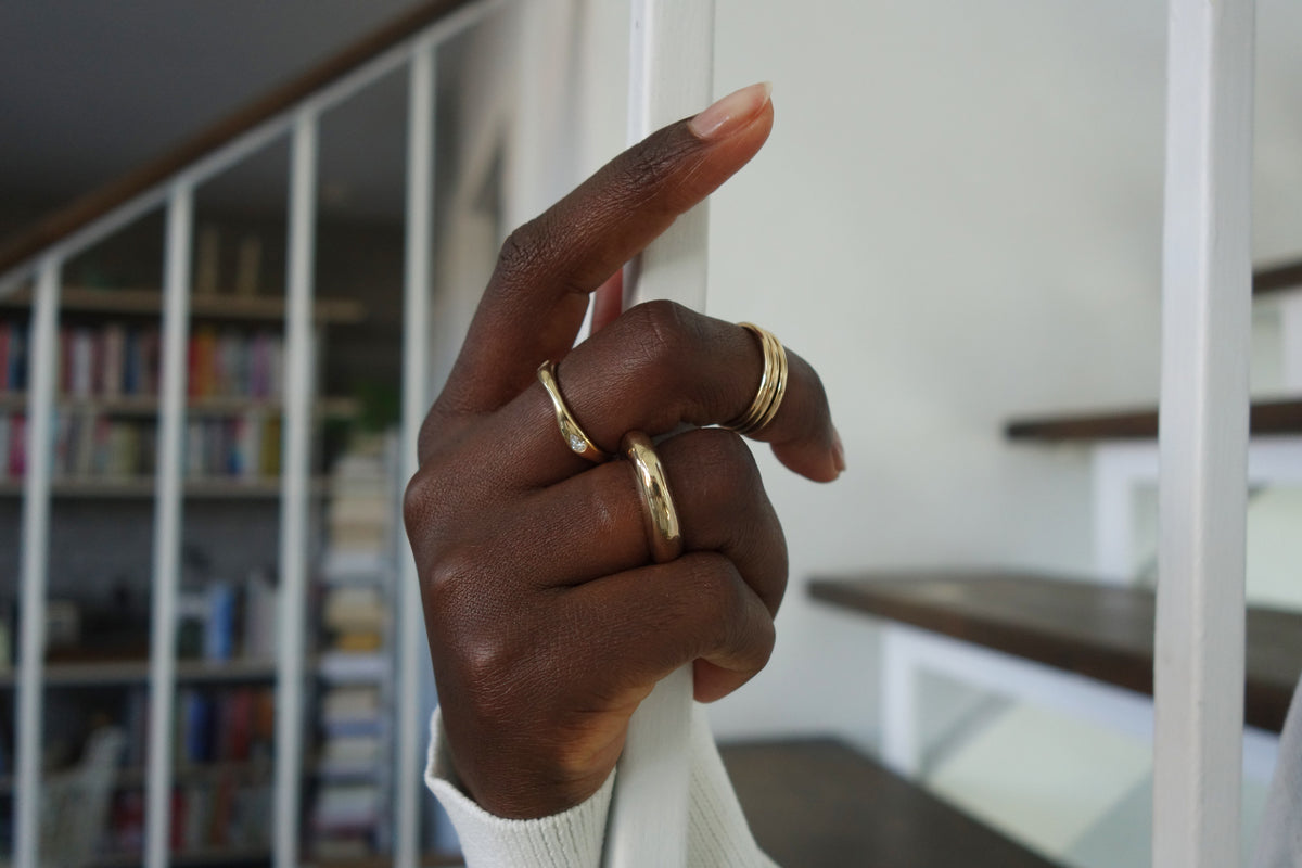 talisman fine jewelry fall 2026 rings, including the new constellation ring, infinite ring stack, and persephone ring.  all handmade in recycled 14k gold with natural diamonds.